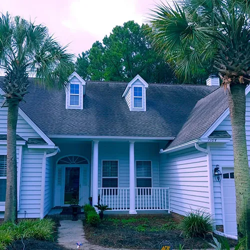 Why Soft Washing is the Best Way to Remove Black Streaks from Your Roof